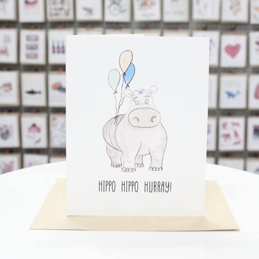 Hand crafted birthday card with hand drawn hippo and balloons. Card stating, "Hippo Hippo Hurray!"