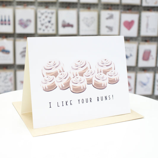 Hand crafted greeting card with printed colored cinnamon buns and the words, "I like Your Buns" at the bottom. 
